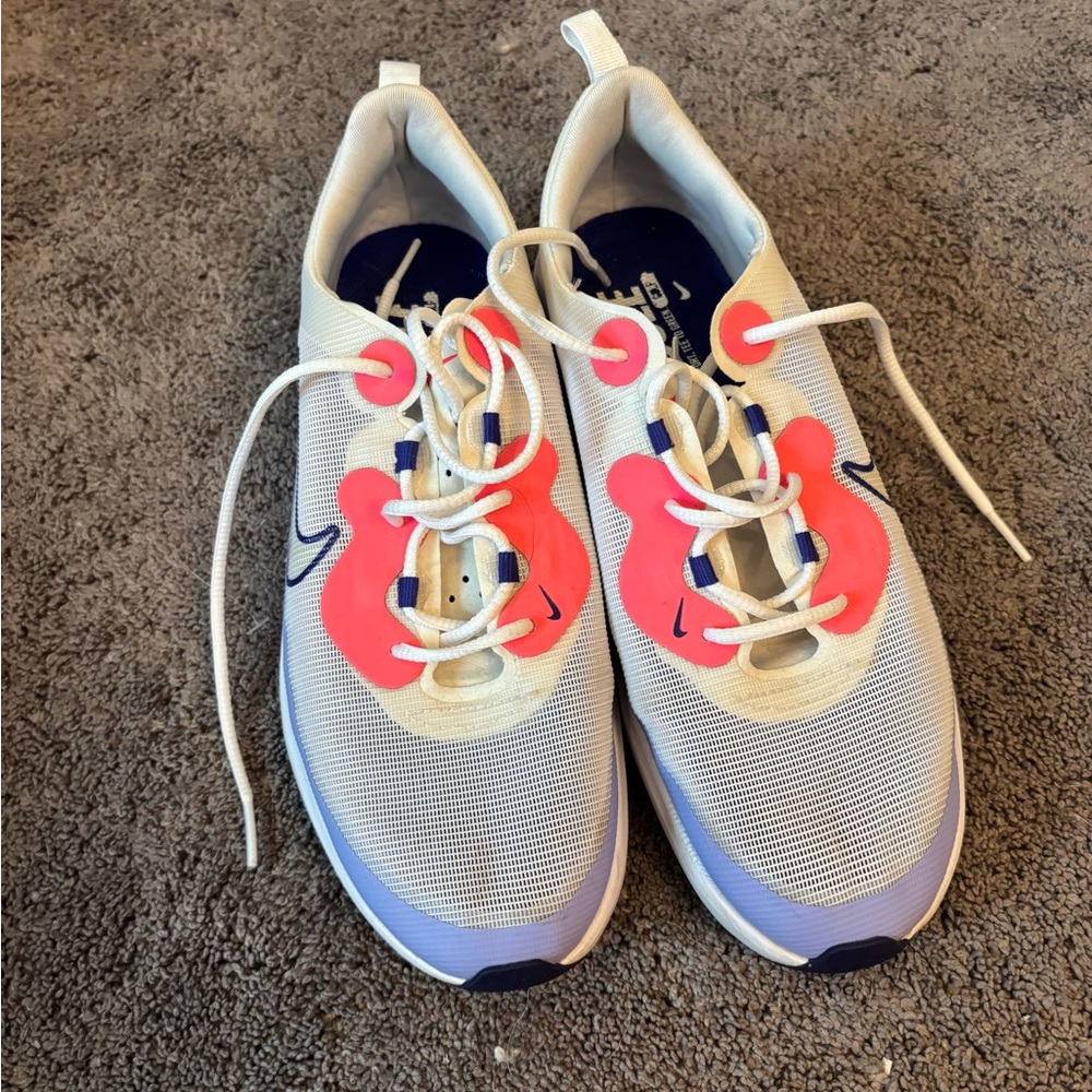 Nike White and Pink Sneakers Modern Athletic Design